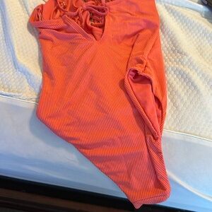 Vibrant Orange One-Piece Swimsuit. Brand new without tags. Never worn